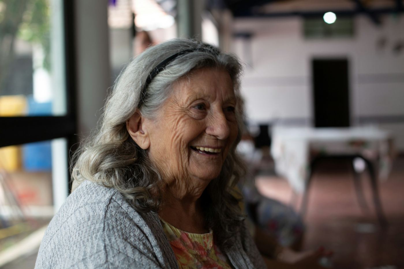 Smiling older woman with silver hair