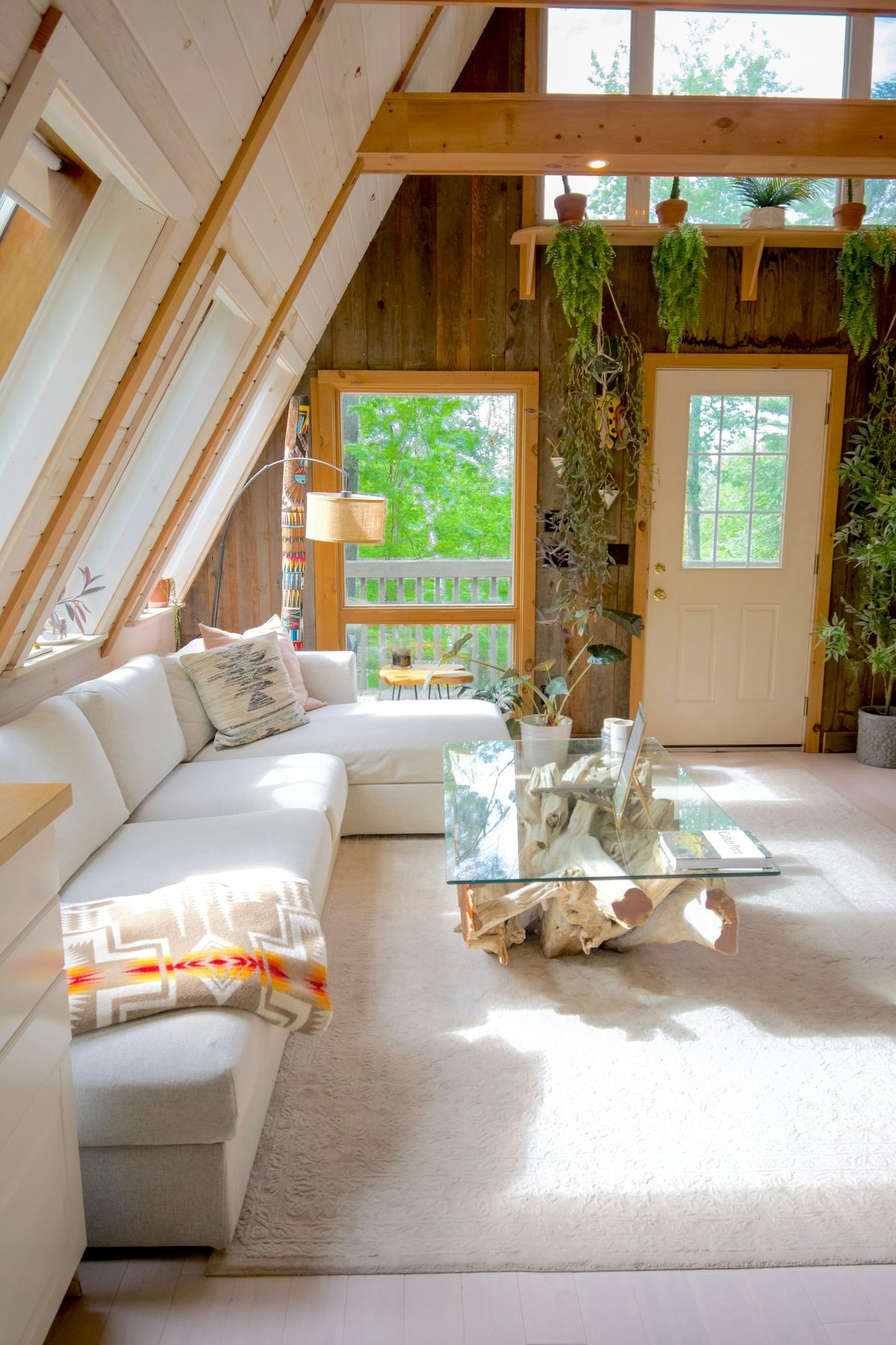 Sunlit living room of a wooden vacation cabin